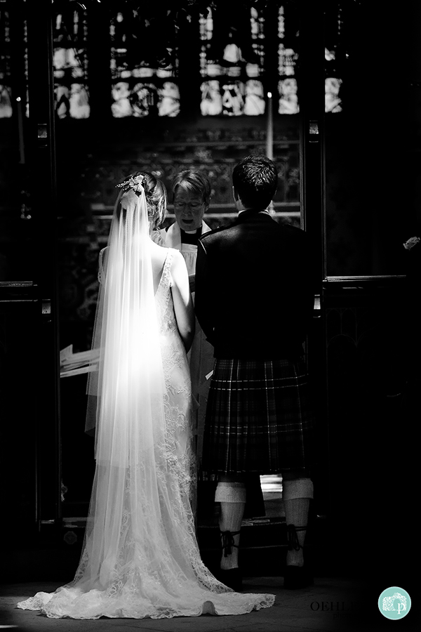 bride and groom at the altar