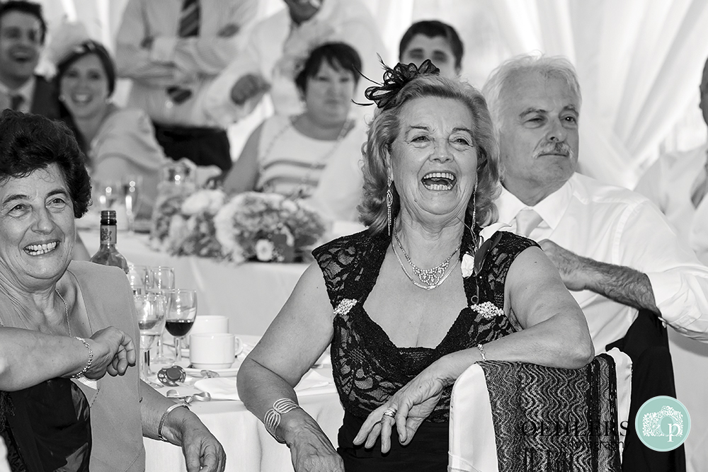 Grandmother having a good laugh at the speeches