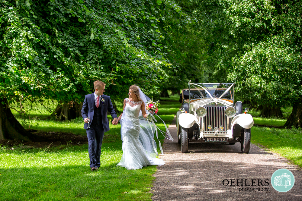 Bride and Groom stretching their legs at Calke Abbey