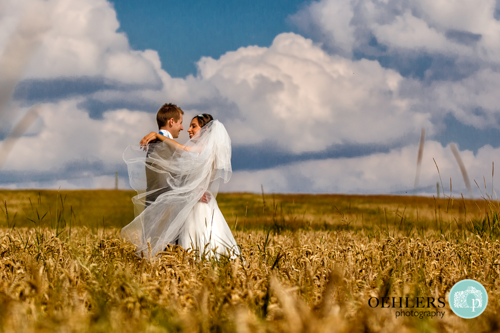 Bride and Groom in a corn field