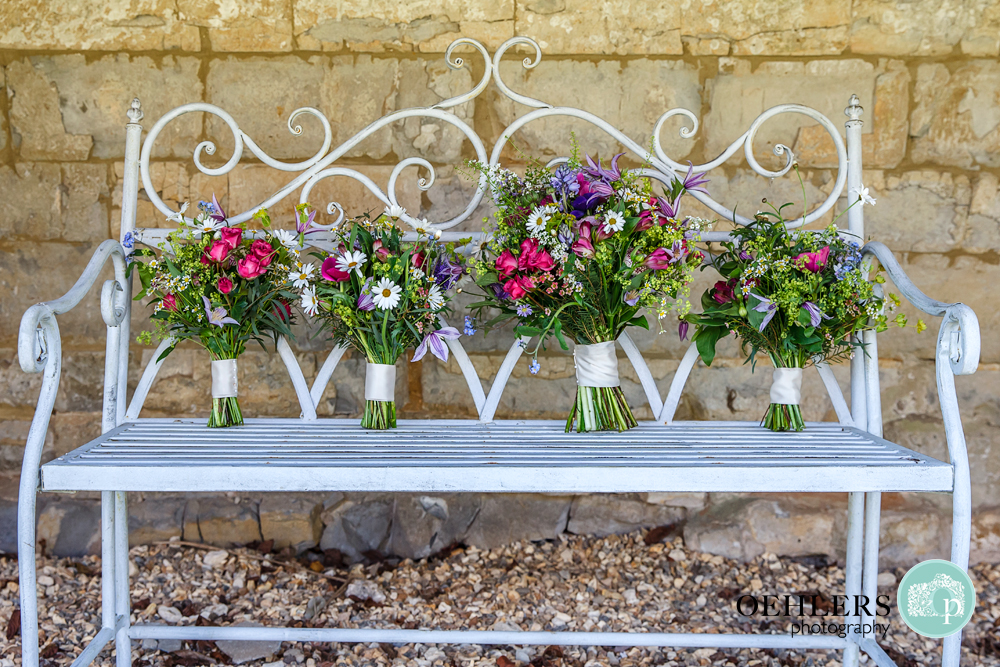 wedding bouquets on a bench