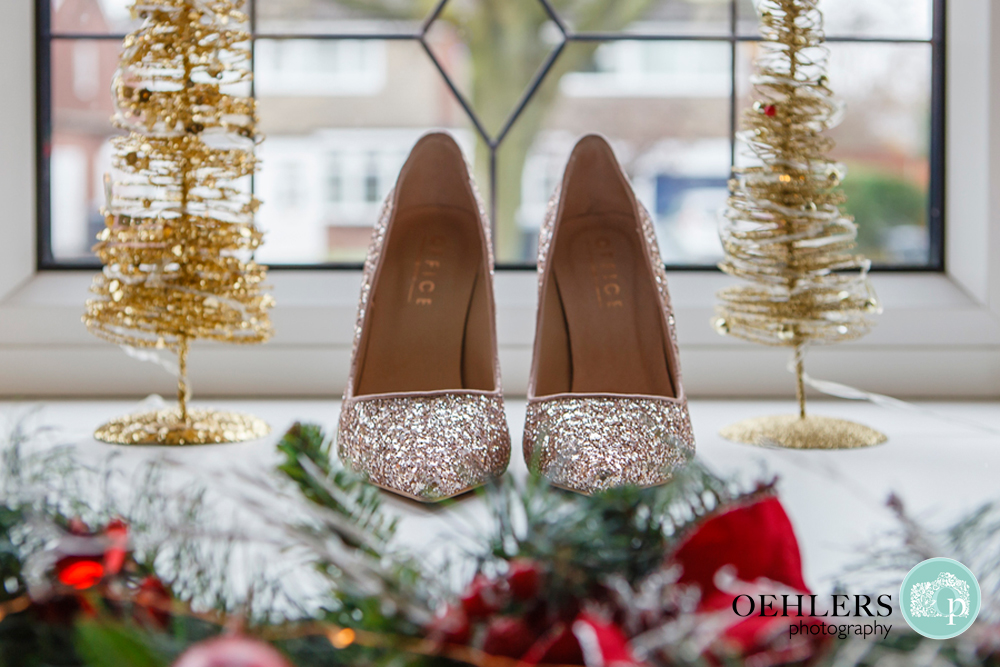 glittery wedding shoes amidst christmas decorations