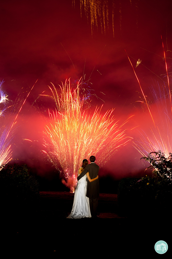 Bride and Groom watching spectacular fireworks