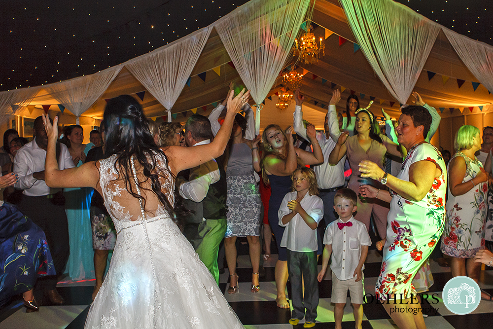 Bride enjoying the dancing