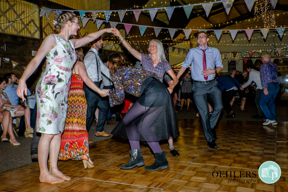 Guests getting tangled in a ceilidh