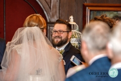 groom looking at his bride at Thrumpton Hall