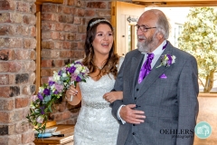 smiling bride and dad