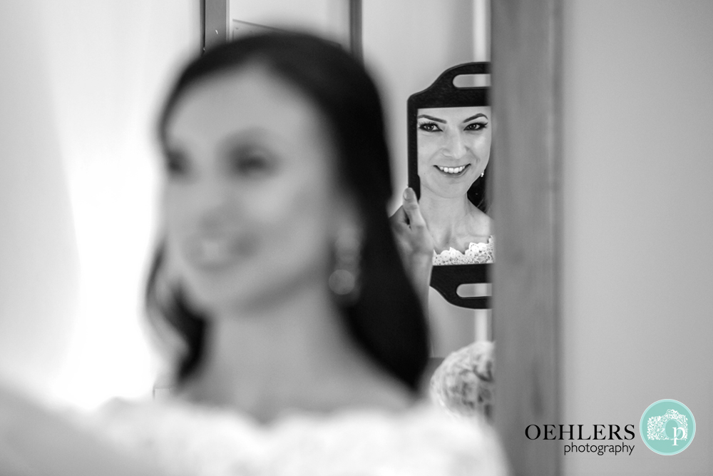bride's reflection in a mirror