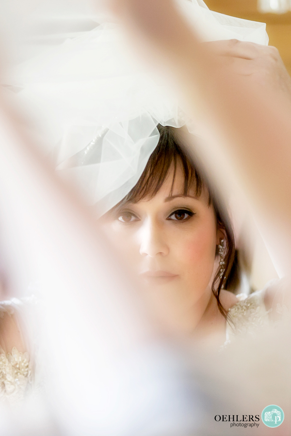 photograph of bride in the mirror
