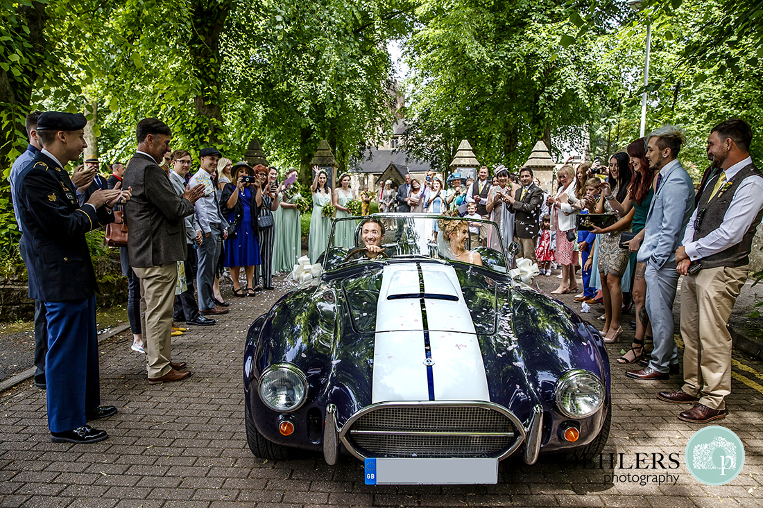 Bride and Groom drive their hired Car