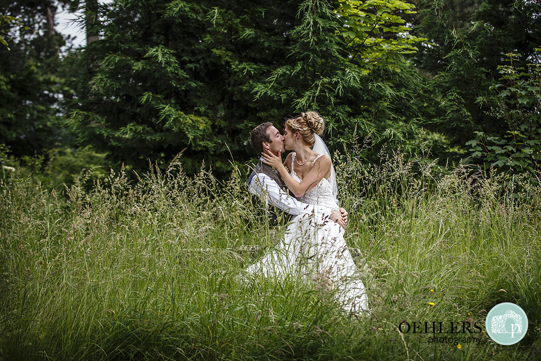 Bride and Groom in the grass