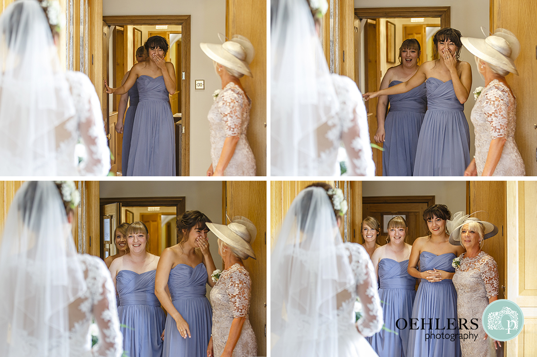 Sister seeing her bride in her wedding dress for the first time