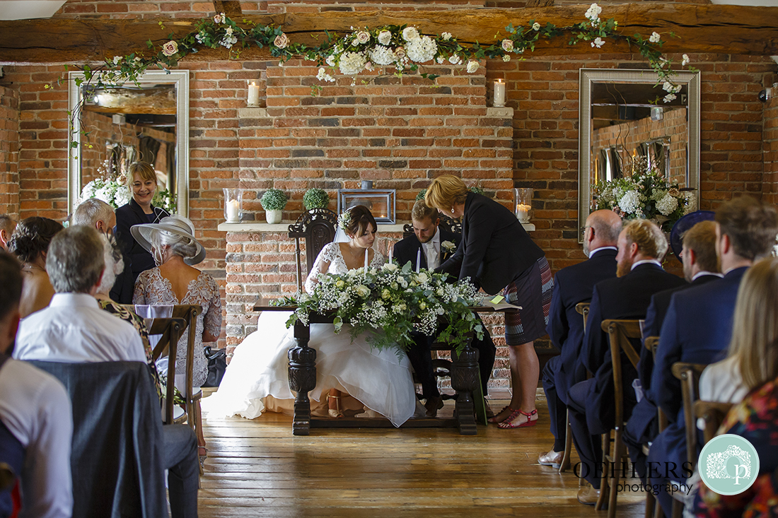 Swancar Farm Wedding Photography-signing the register