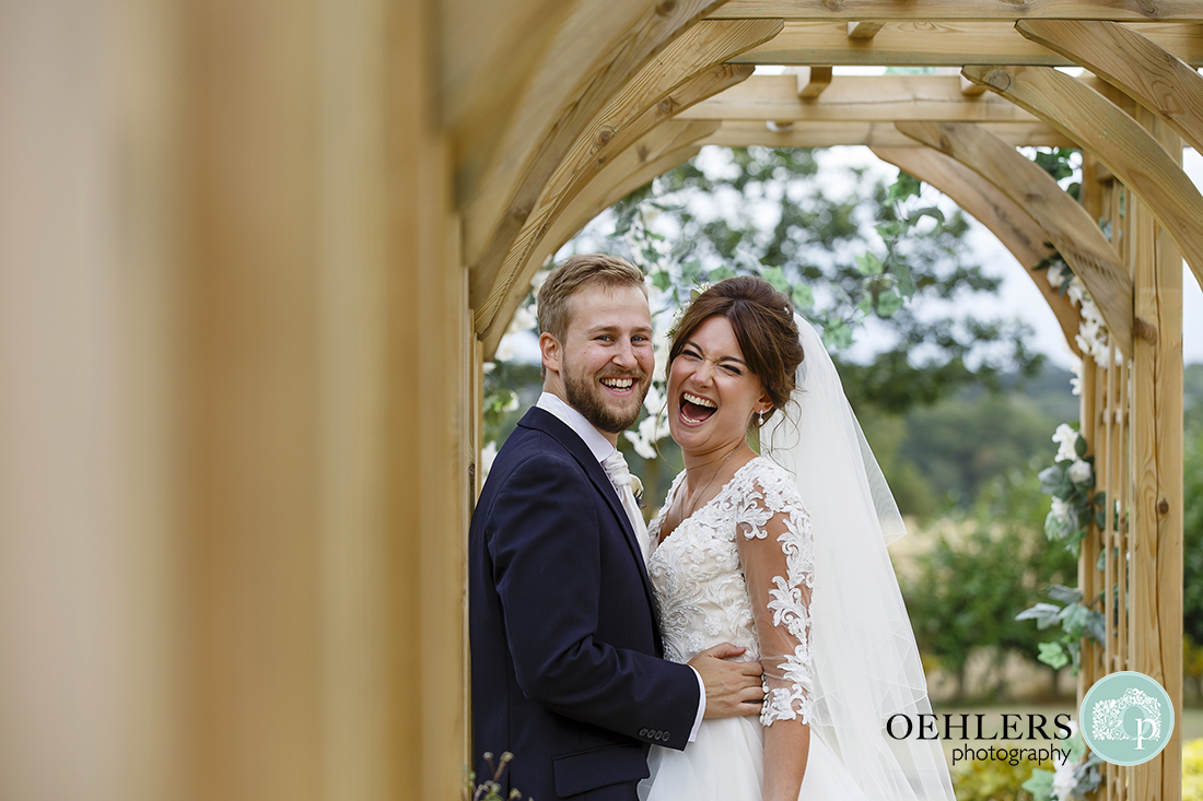 Swancar Farm Wedding Photography-Bride and Groom laughter