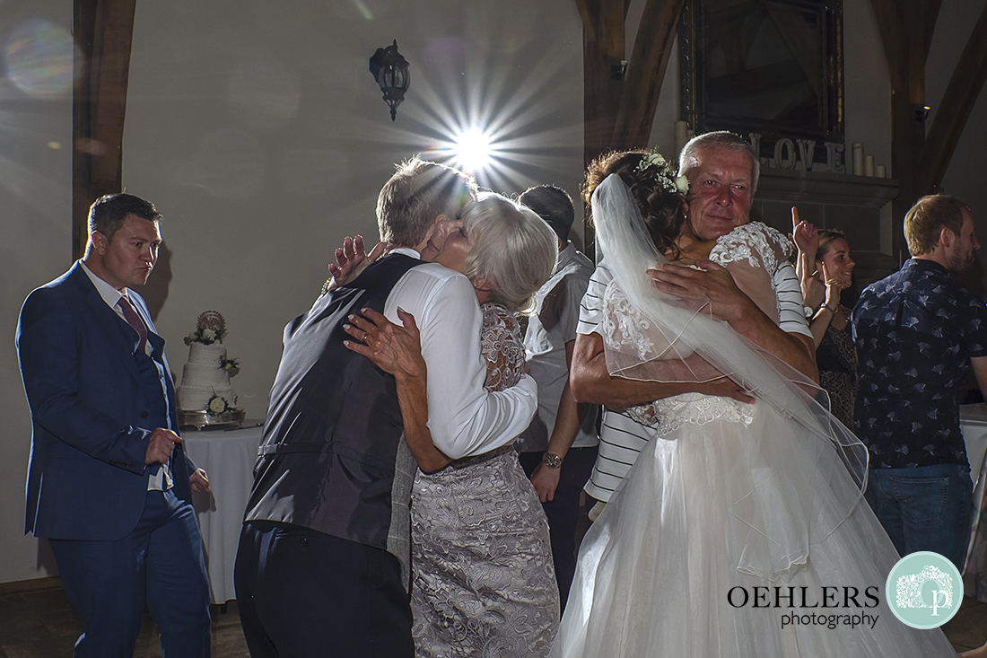 Swancar Farm Wedding Photography-Bride and Groom greeted by parents