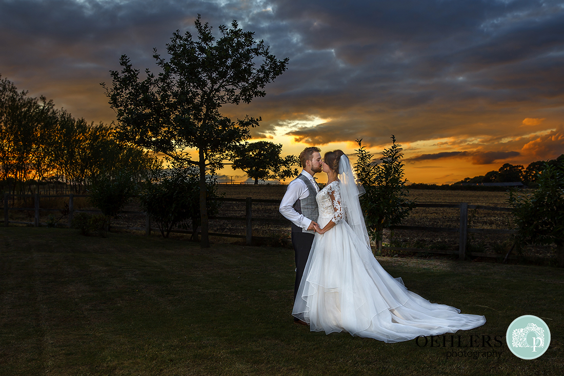 Beautiful sunset with the bride and groom