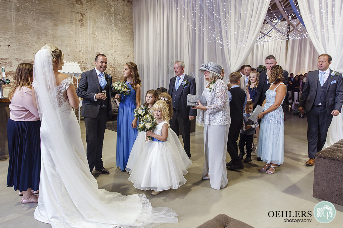 bridal party in a line after walking out of the wedding ceremony area