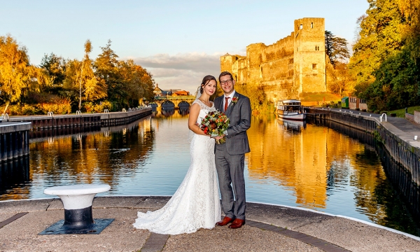 couple posing in front of Newark Castle