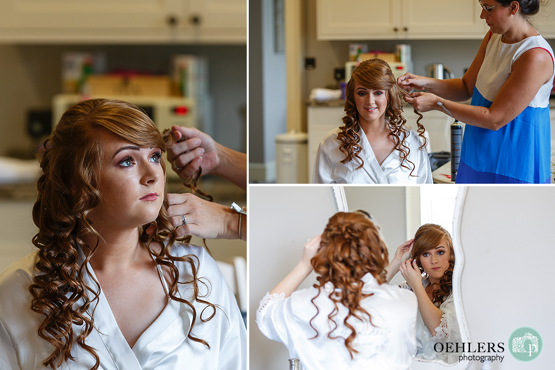Bride getting her hair done in curls