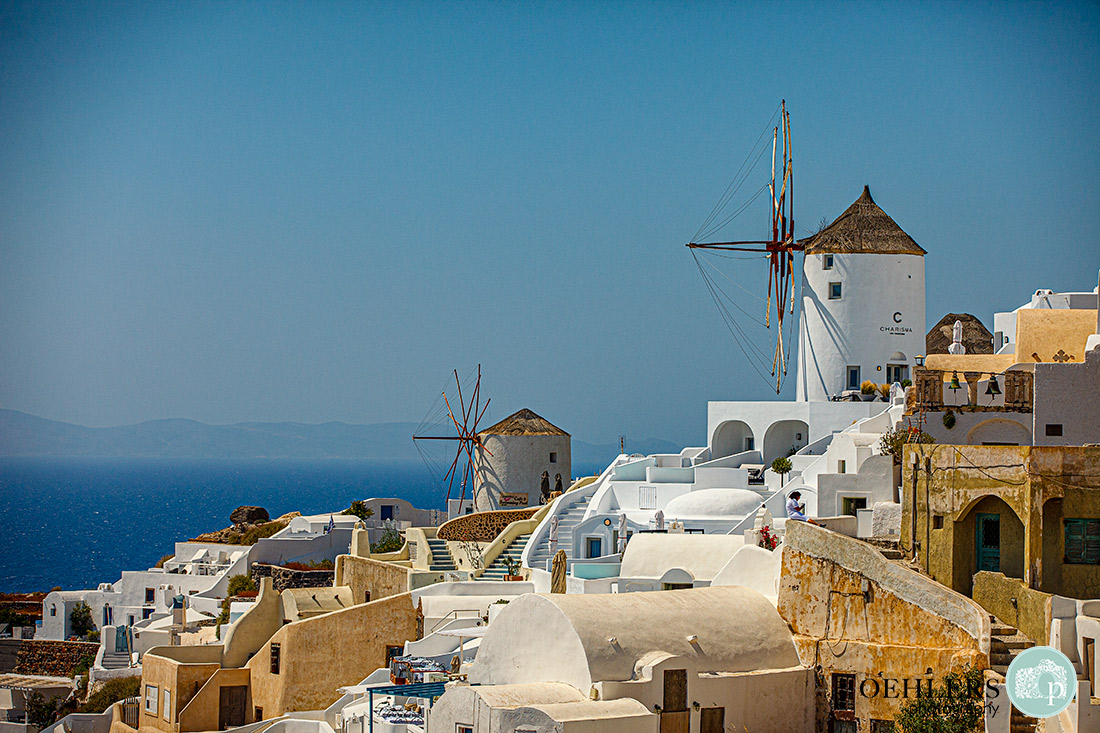 Santorini Wedding Photographers - the windmills of Oia on the Greek Island of Santorini.