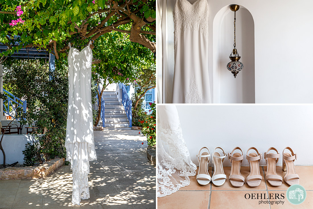 Destination Wedding Photographers - dress hanging from a bougainvillea tree as well as shoes of bridesmaids and bride on the floor.