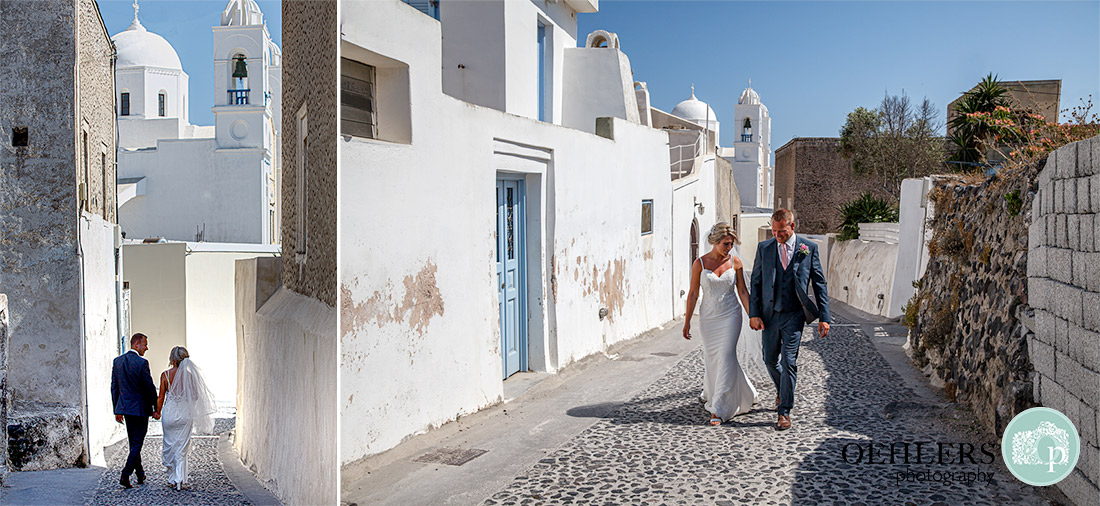 Destination Wedding Photographers - Santorini - walking on the cobbled streets in Santorini.