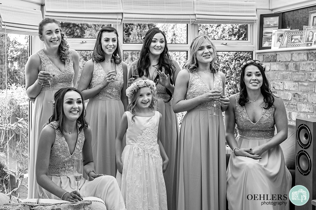 Osmaston Park wedding photography - Bridesmaids looking at the bride