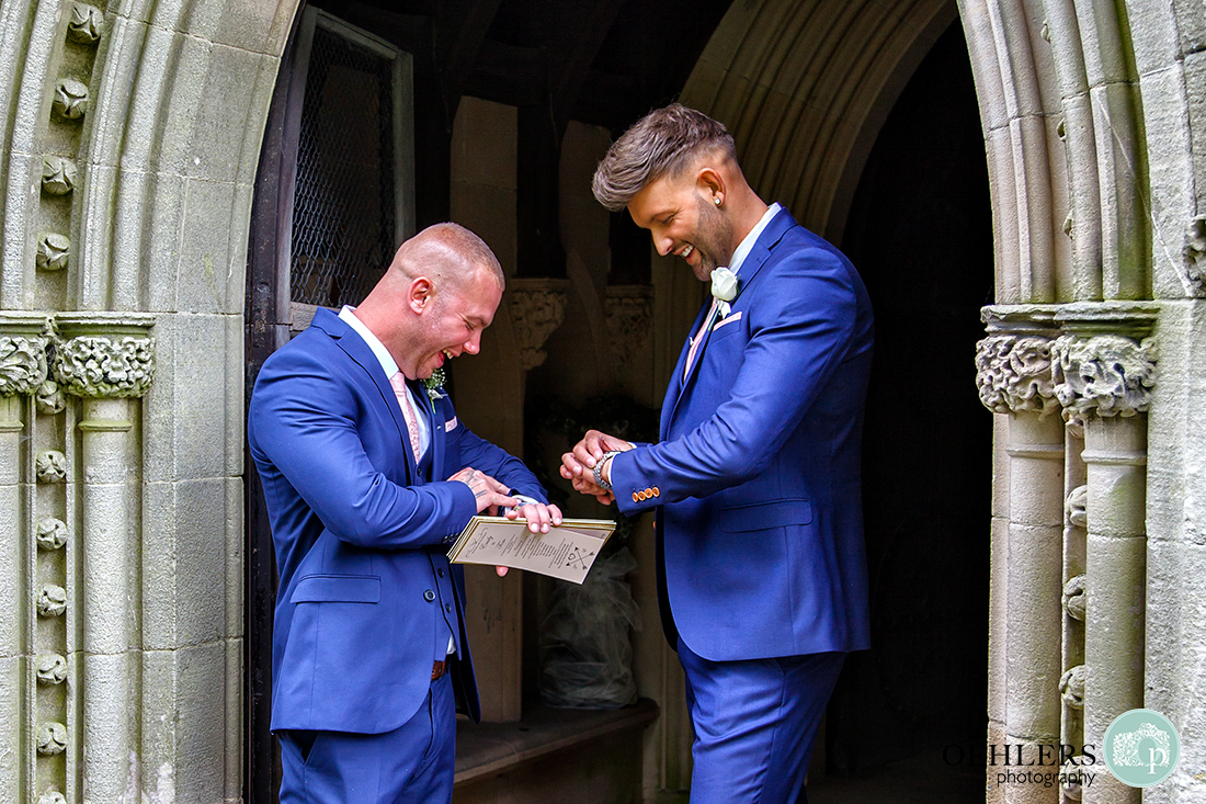 Osmaston Park wedding photography - St Martin's Church, Osmaston - Groom and his bestman checking the time.